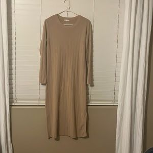 Ribbed sweater dress. It’s a midi with slit on one side of the dress.